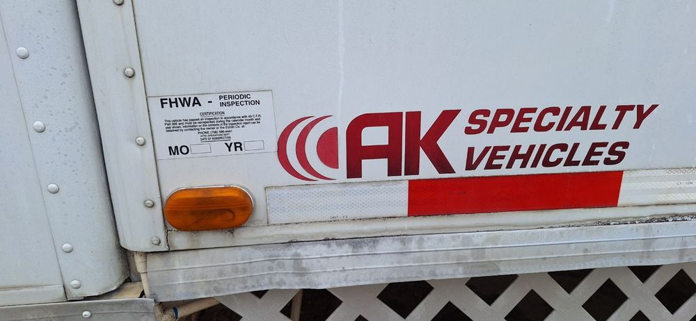 AK Specialty Vehicles Trailer Side with FHWA Inspection Sticker
